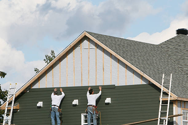 Professional Emergency Siding Repair technician working in Camden, TN